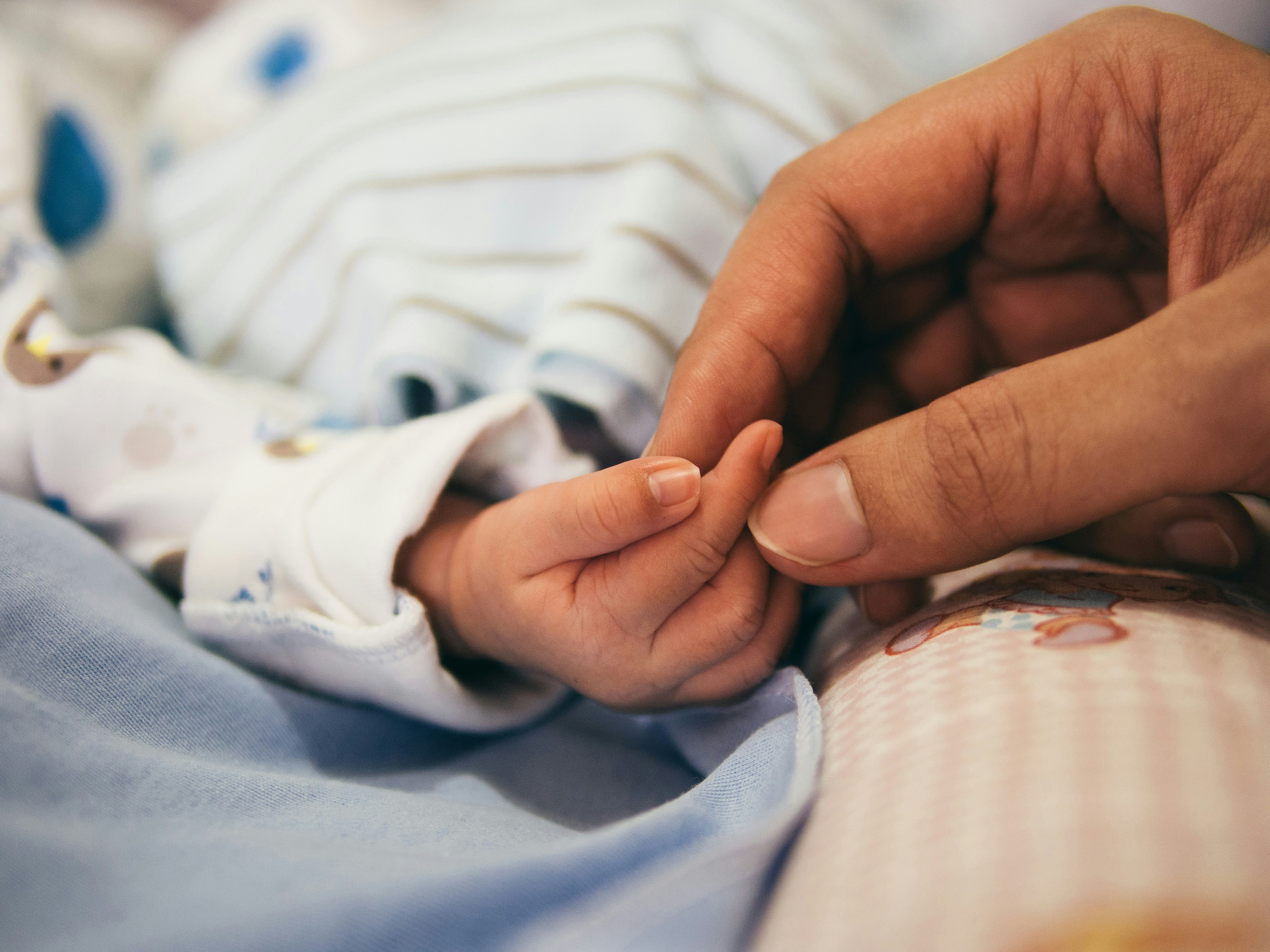Pediatrician caring for baby