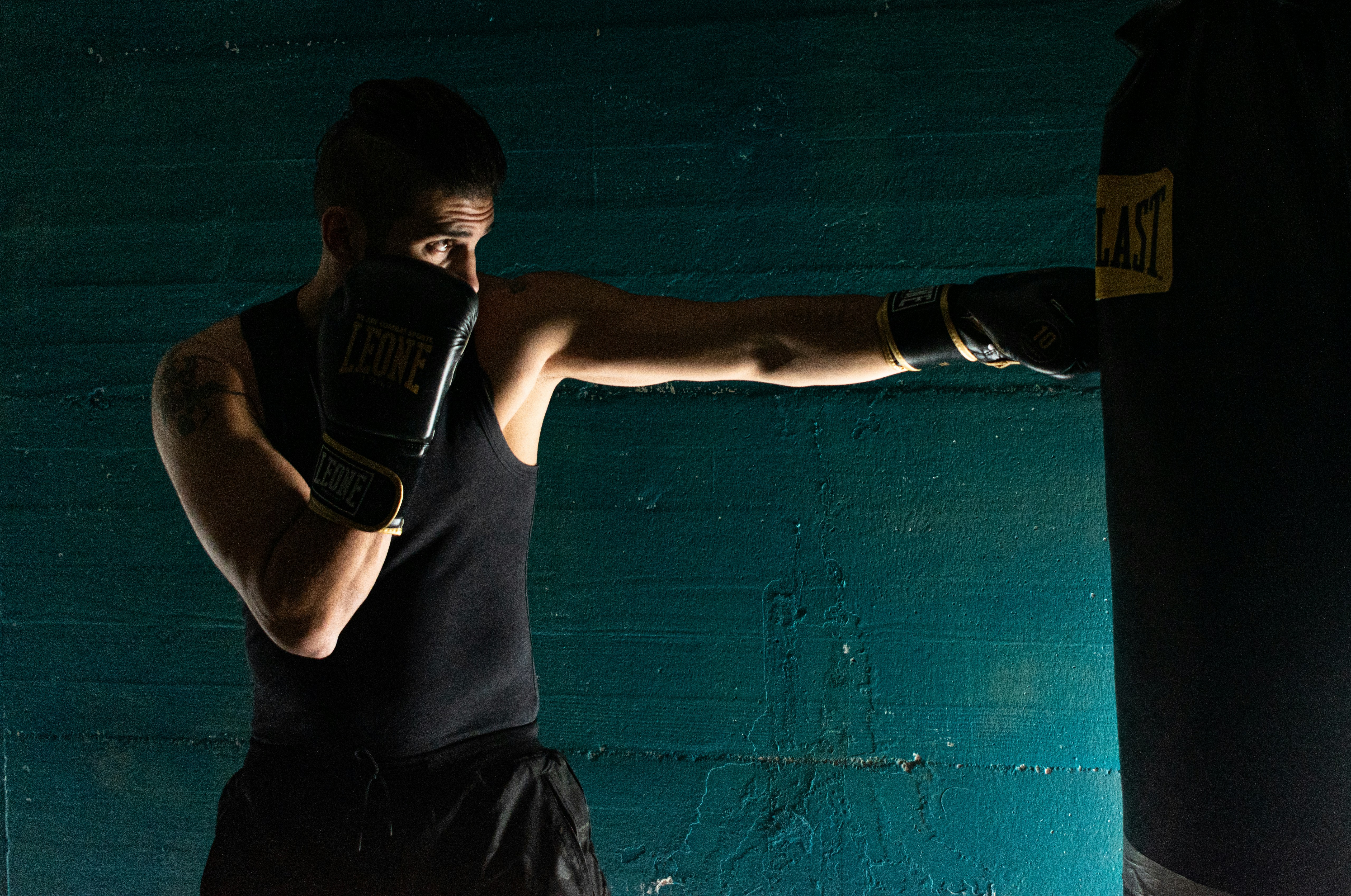Athlete training with boxing gloves
