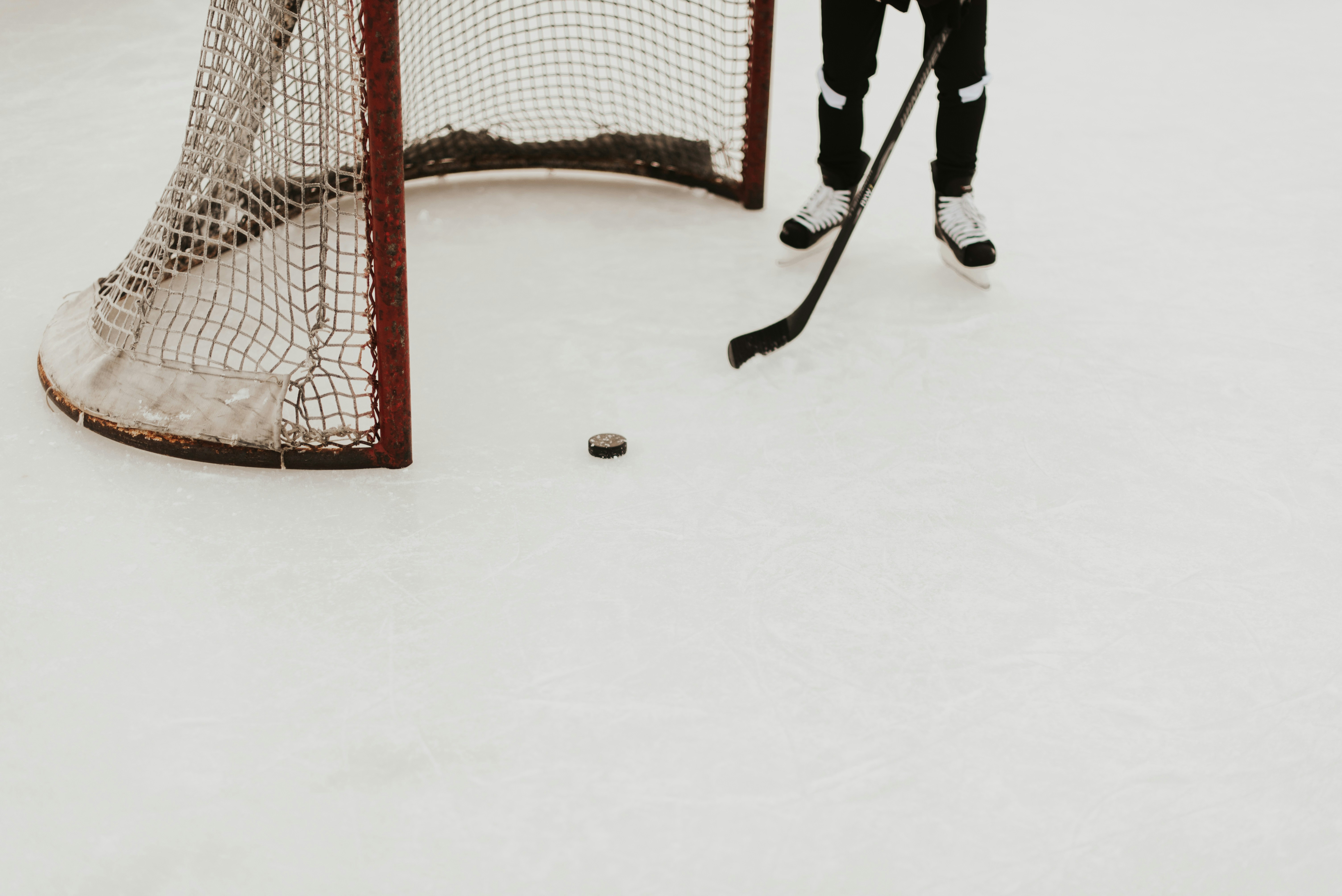Ice hockey player standing near the goal